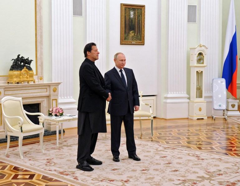 Pakistan’s former Prime Minister Imran Khan with Russian President Vladimir Putin in February 2022 [Mikhail Klimentyev/EPA]