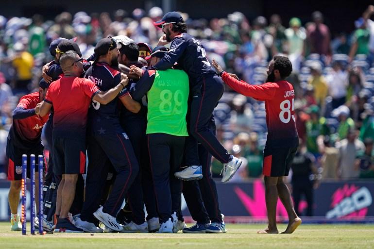 Players of the United States celebrate after their win [Tony Gutierrez/AP Photo]