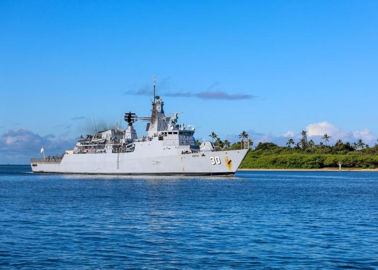 The Royal Malaysian Navy Lekiu-class guided missile frigate KD Lekiu arrives in Hawaii. It has the number 30 on its bow.