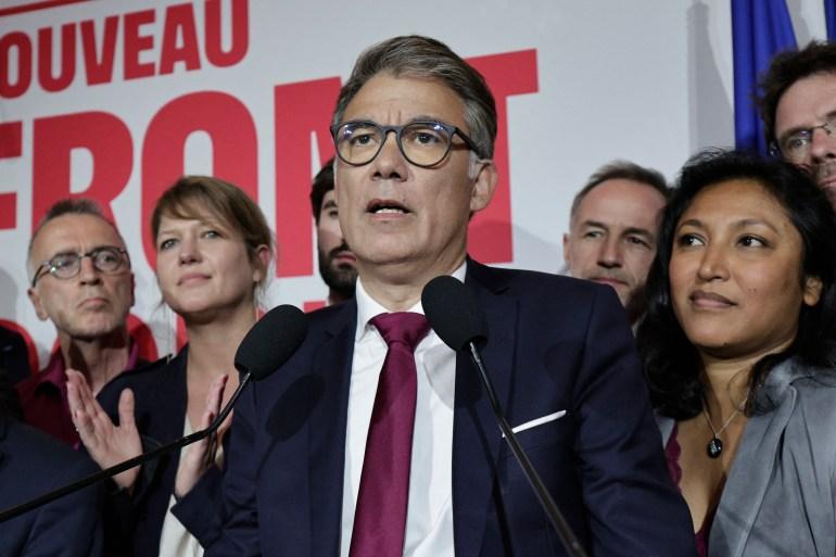 Olivier Faure, centre, the first secretary of the French Socialist Party, says the leftist coalition will choose a prime minister candidate this week [Stephane de Sakutin/AFP]