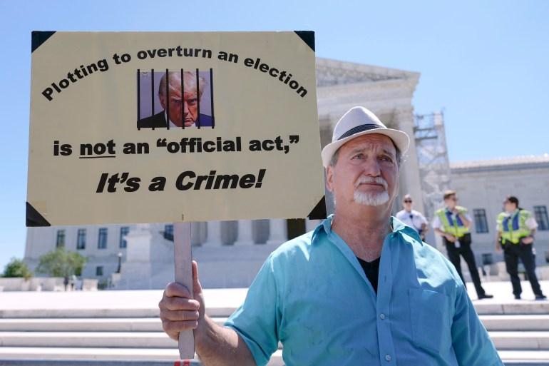 Gary Roush, of College Park, Md., protests outside the Supreme Court Monday, July 1, 2024, in Washington. [Mariam Zuhaib/AP]