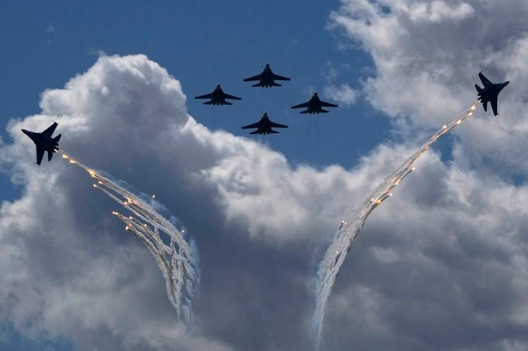 Sukhoi Su-35S jet fighters of the Russian Knights aerobatic team perform during the International Maritime Defence Show ‘Fleet-2024’ in Kronstadt, outside St Petersburg, Russia, Friday, June 21, 2024. India’s Air Force has long relied on Sukhoi jets [Dmitri Lovetsky/AP]